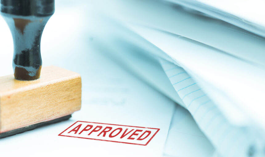 approved documents or project, shallow depth of field, focus on stamp